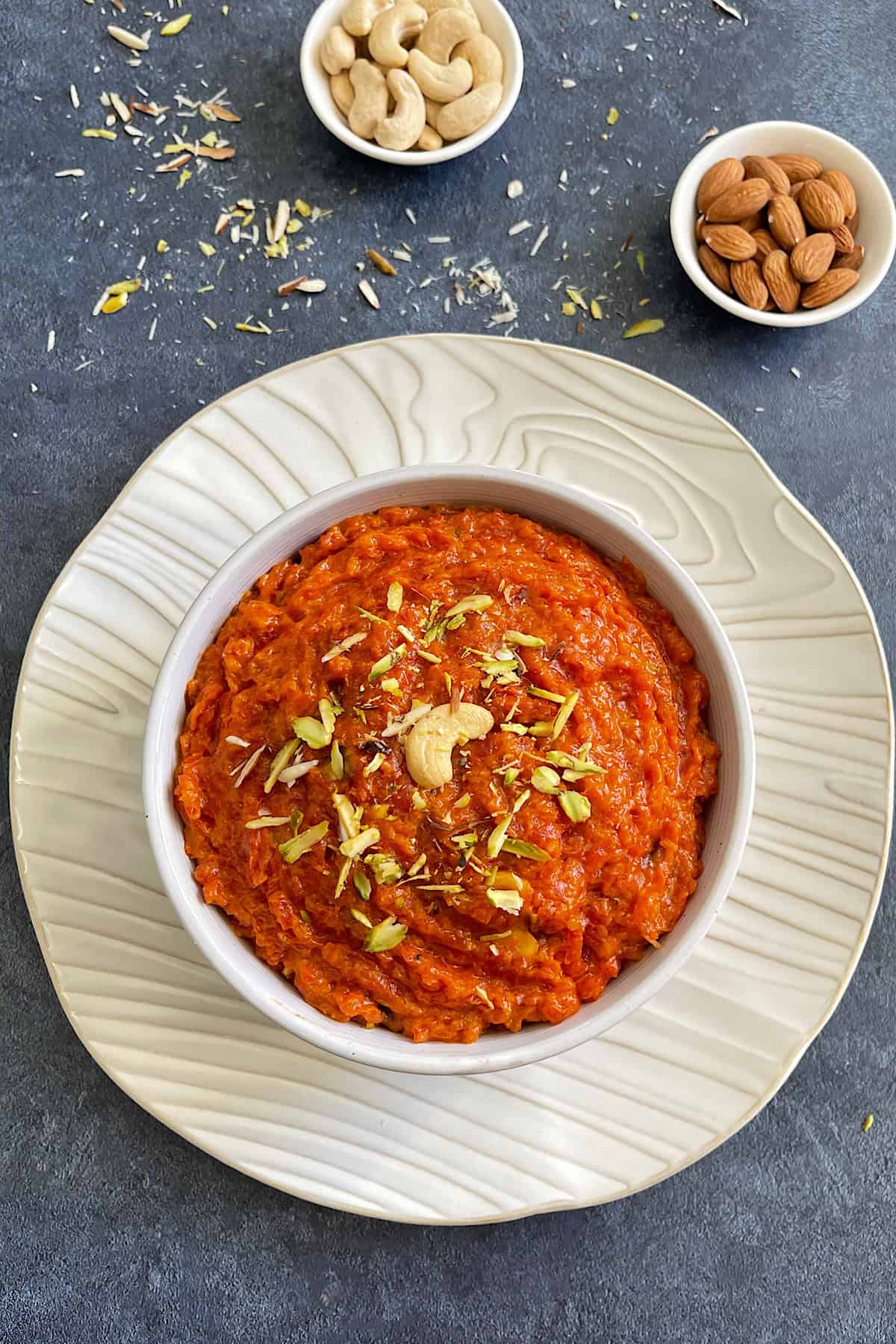 Gajar halwa is also known as Carrot halwa or Gajrela (as it’s known in Punjabi). Gajar ka halwa is a traditional North Indian dessert. It is made with carrot, ghee, milk, sugar, cardmom powder and dry fruits.